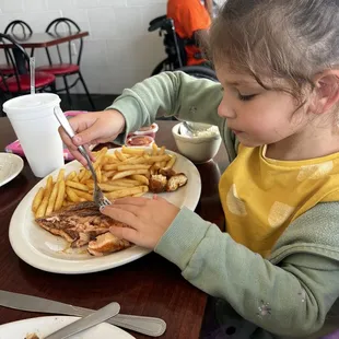 Granddaughter chowing down!