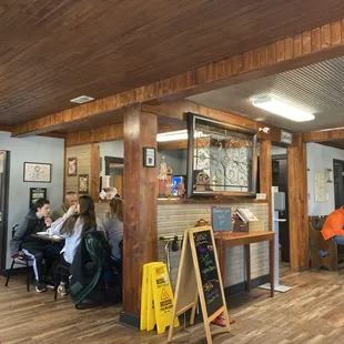 a group of people sitting at tables