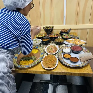 Tsigay/ owner / sweetest lady you will ever meet doing her thing.