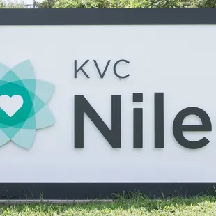Niles exterior sign by the road.