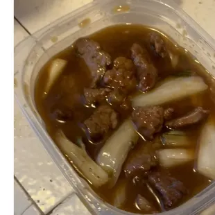 a bowl of beef and vegetable soup