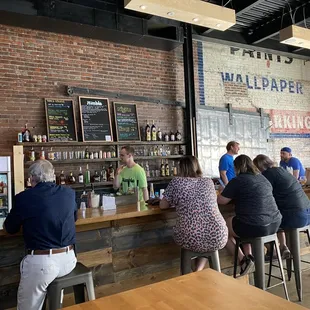 people sitting at the bar