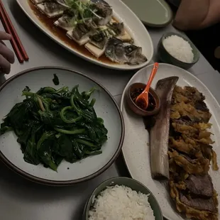 Greens, fish, and rib eye.