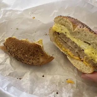 Breakfast sandwich with sausage on everything bagel! So good!