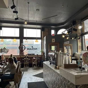 Looking at the coffee bar and entrance to the coffee shop.