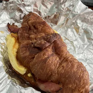 Bacon egg cheese croissant sandwich . Very yummy and perfect proportion of everything!