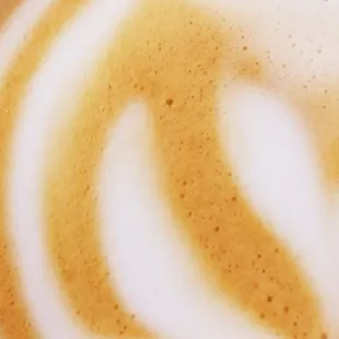 really nice detail in the latte, it was much prettier before i tripped on a cobblestone :)   also, its smooth and delicious