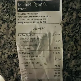 Uber Eats receipt full of the oil leaking from the containers.