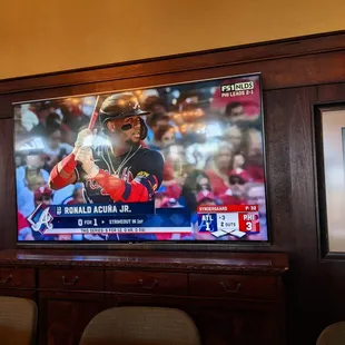Inside watching the Braves at one of the TVs by the bar.