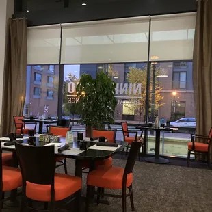 a dining room with a view of the street