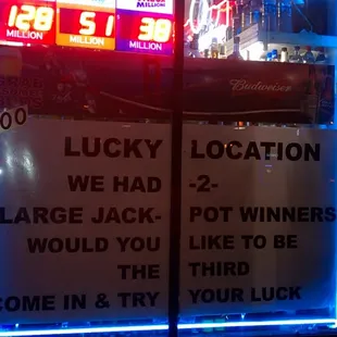 a neon sign in a window