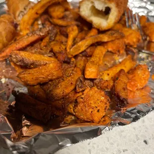Tots, fries and the empty corn dog shell (after we air fried everything)