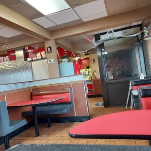 Looking toward the back. The counter where you order is further down and to the left. Side entrance to the right ahead.