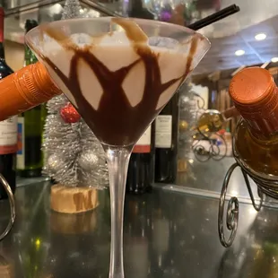 a martini with chocolate sauce