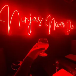 a person holding a glass of wine