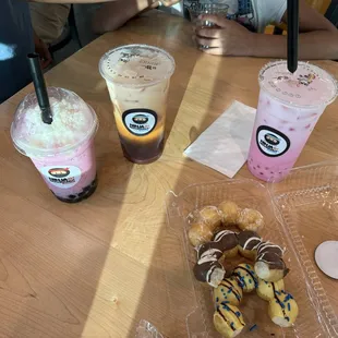 Mochi donuts, pink milk shaved ice w/boba, pink milk w/strawberry boba.