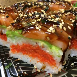 a close up of a piece of sushi