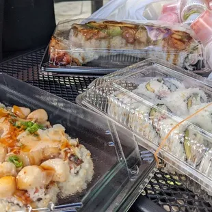 Scallop dynamite roll, California roll, dragon roll