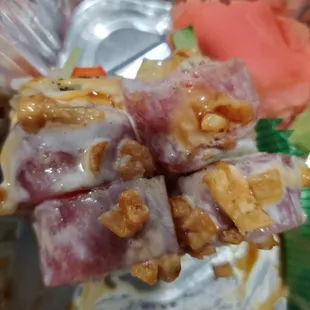 Crispy noodles, not Tempura. No scallions. Tuna is NOT seared as per the Portage Roll description.