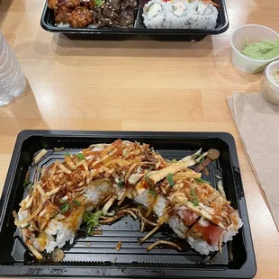 two trays of food on a table