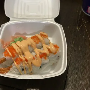 a container of sushi