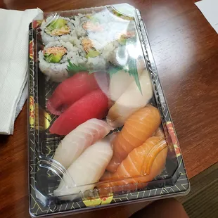 $24 SUSHI DINNER. It was suppose to be a sushi, 8pc of chefs choice on sushi roll and 1 roll of California roll.