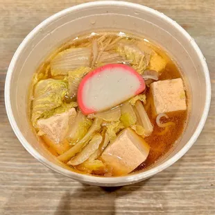 Sukiyaki (hot pot). Tender slices of beef, vegetables, medium firm tofu, and thin glass noodles in a broth. (See other pic for beef)