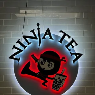 a neon sign for a restaurant