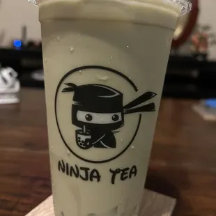 Honeydew milk tea with lychee jelly