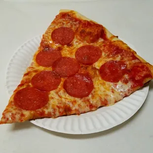 a slice of pepperoni pizza