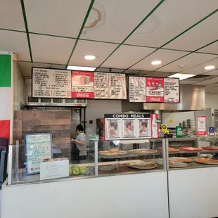a woman standing in front of the counter