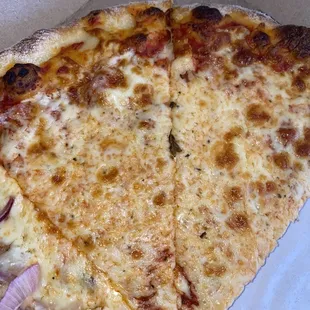 two slices of pizza in a box