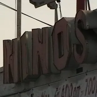 the neon sign for the restaurant