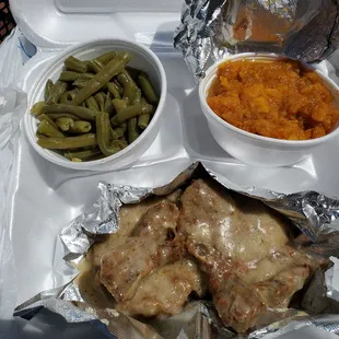 Smothered Pork Chops with green beans and yams