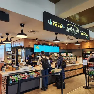 customers at the counter of a restaurant