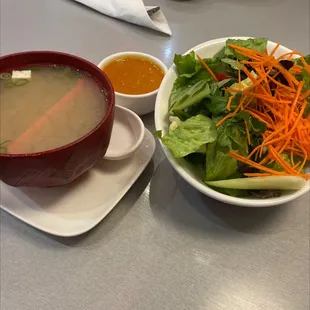Miso soup and house salad that comes with entree