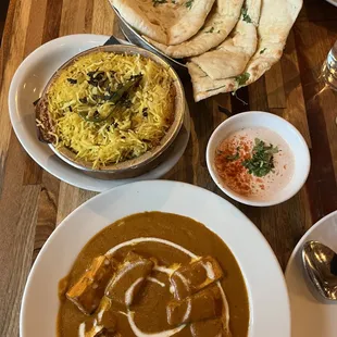 Paneer Makhai masala, dum chicken biryani, and garlic naan