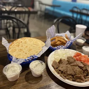 Yummy gyros plate and onion rings