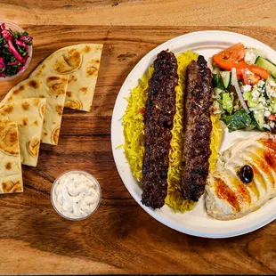 Kebab combo plate with Rice, Hummus and a greek salad. Niro&apos;s House Mediterranean Kitchen 3617 E Southern Ave, Mesa, AZ 85206