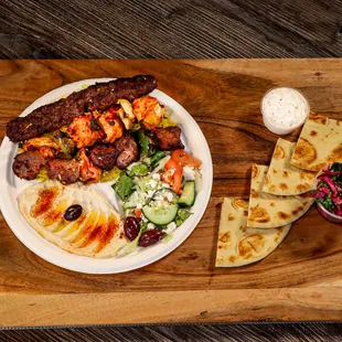 3 kabob combo plate, hummus, greek salad and w/rice Niro&apos;s House Mediterranean Kitchen 3617 E Southern Ave, Mesa, AZ 85206