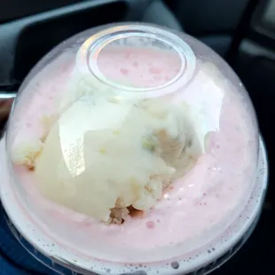 Badshadi Faloodi $7.99 in 12oz cup: rose water shake, basil seeds, faloodi noodles, and scoop of pistachio ice cream (top view)
