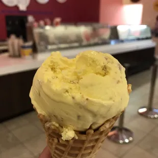 Butterscotch ice cream in a waffle cone