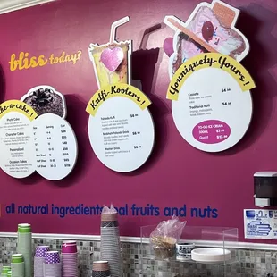 the menus and prices on the wall