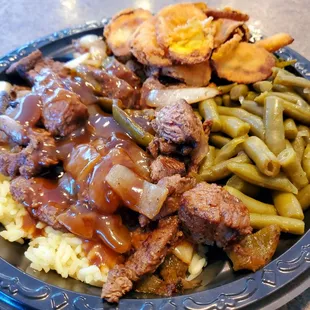 Beef Tips over Rice with Gravy, Fried Squash and Green Beans. Never disappoints and always delectable!