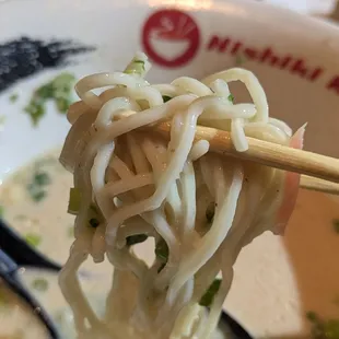 Noodle soaking the broth