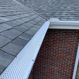 a gutter on the roof of a house