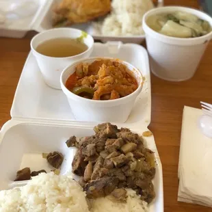 a meal of rice, meat and vegetables