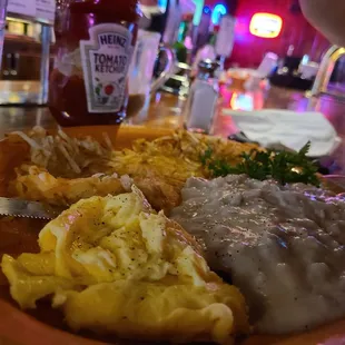 Chicken Fried Steak Breakfast... with gravy, eggs, hash browns and toast.