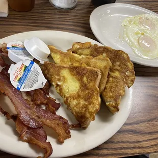 French toast special included bacon, I added over easy eggs. So delicious!