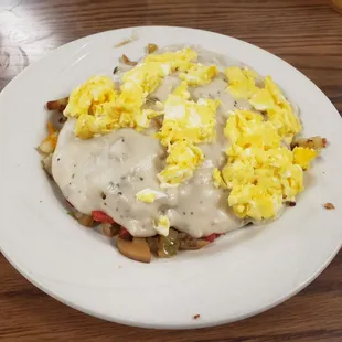 The Scrambler  Ask for your side to be a biscuit and then ask that they put it underneath the rest of the items.